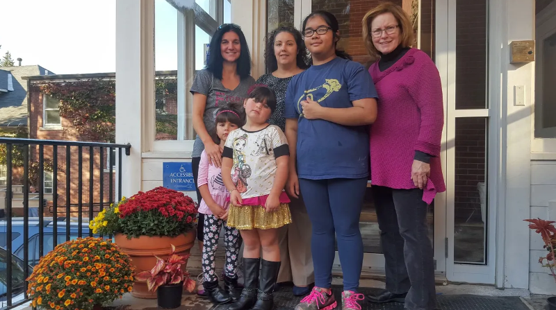 Family outside YWCA